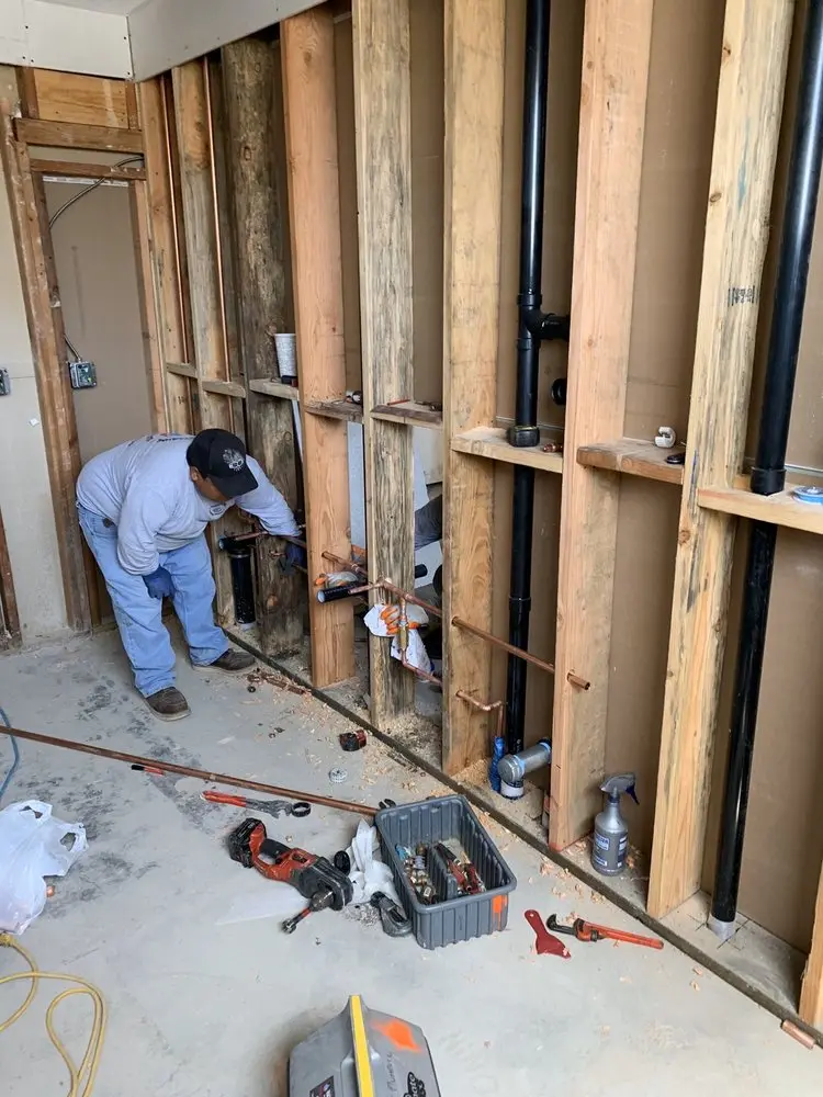 Commercial rough-in plumbing for Water Heater Replacement in Kings Park West